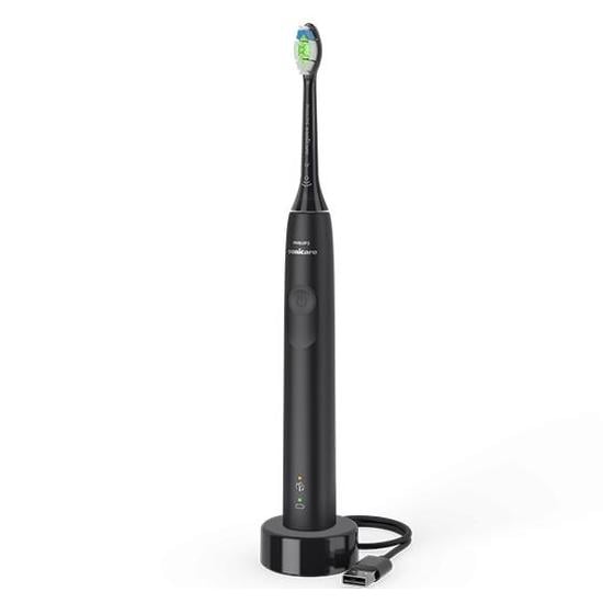 Philips Sonicare 4100 electric toothbrush in black with a matching charging base and USB cable on a white background.