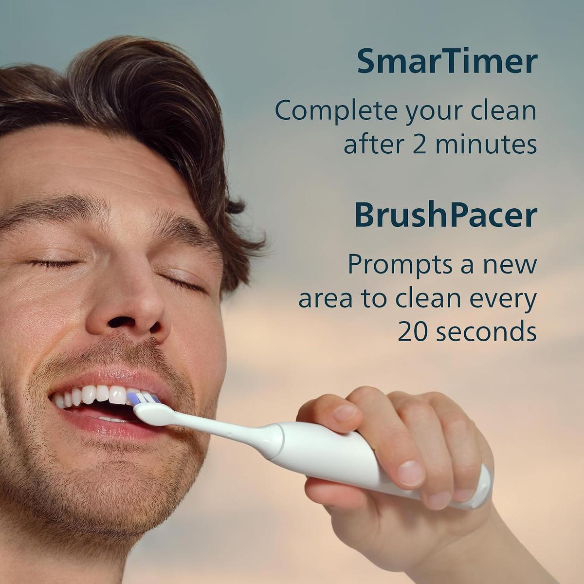 Man using a white Philips Sonicare electric toothbrush with text highlighting SmarTimer and BrushPacer features.