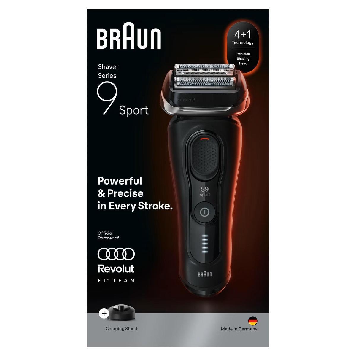 Braun Series 9 Sport electric shaver in black with 4+1 shaving head technology, power button, and charging stand.