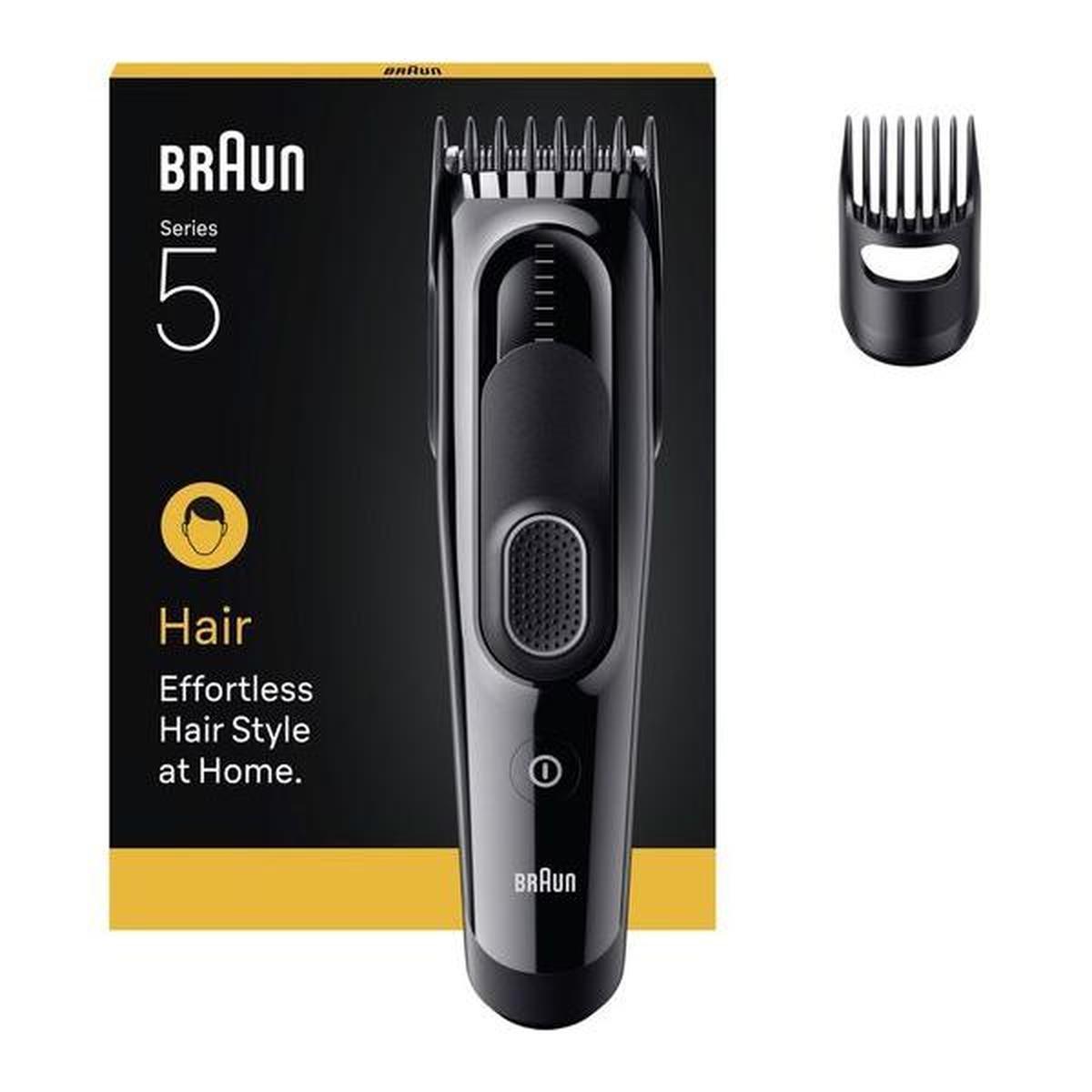Black Braun Series 5 hair clipper with stainless steel blades, rubberized grip, and a detachable length setting comb.