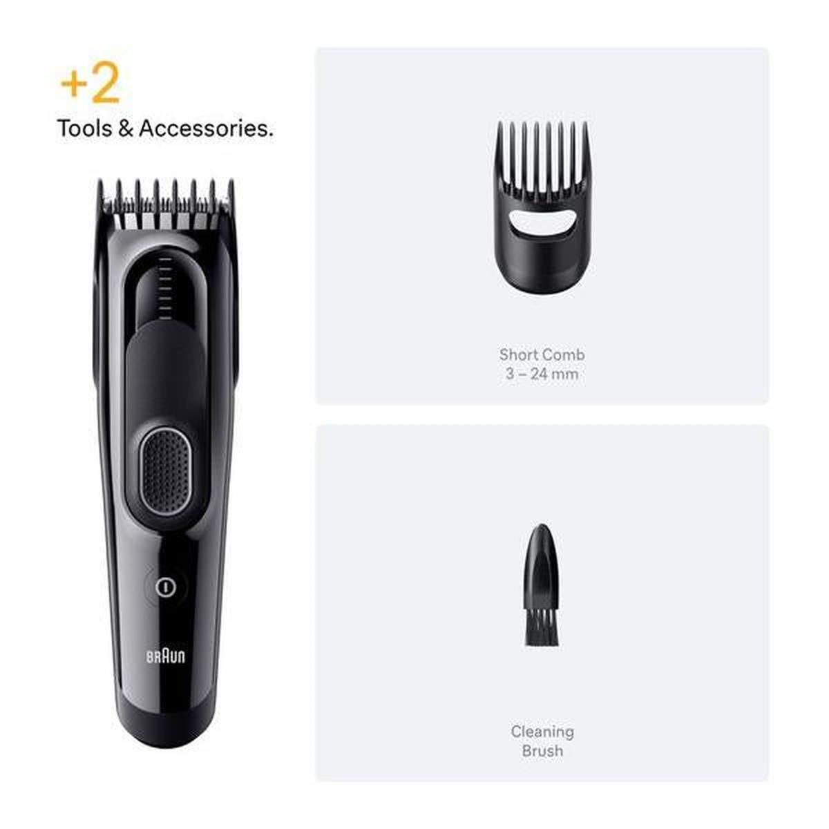 Black Braun Series 5 hair clipper with a 3-24mm adjustable comb and a small cleaning brush on a white background.