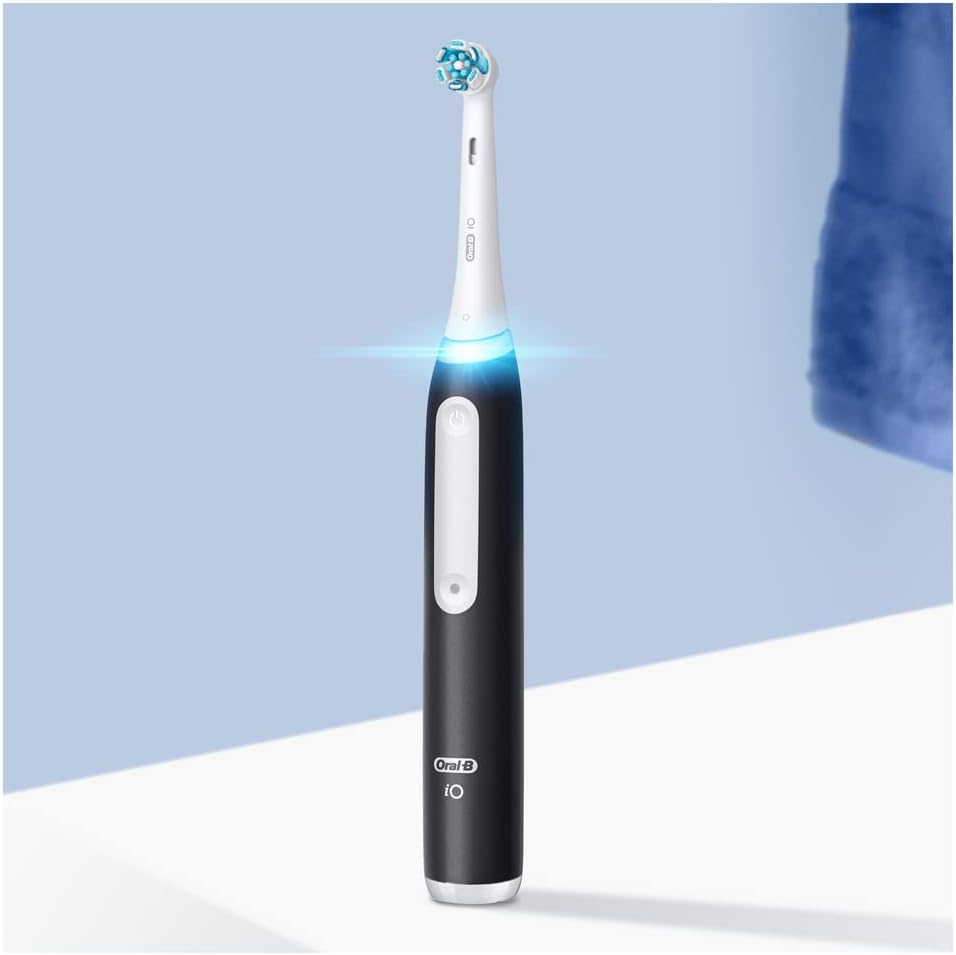 Oral-B iO3 Electric Toothbrush 1 Toothbrush Head & Travel Case, 3 Modes With Teeth Whitening - Pink