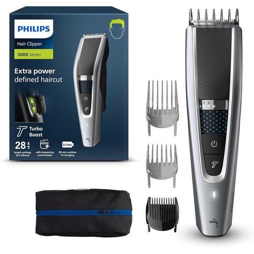 Philips Series 5000 hair clipper in silver with three attachment combs, storage pouch, and branded product packaging.